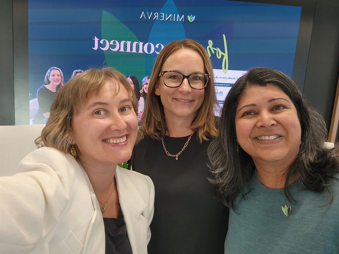 Three attendees together at the Minerva Forum